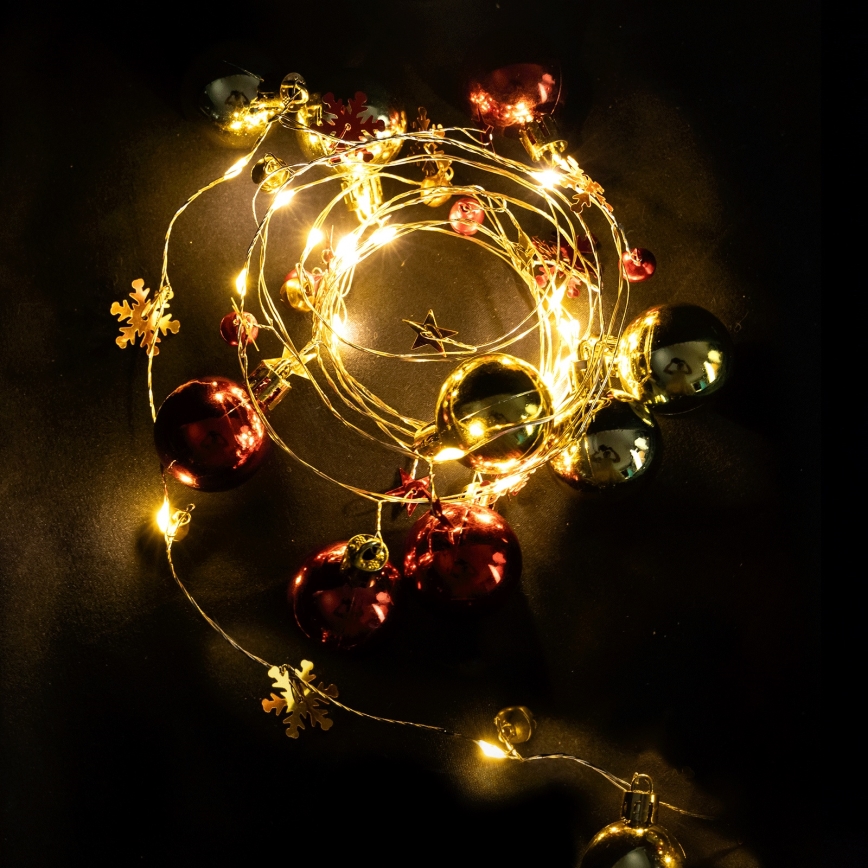 Aigostar - Cadena de luces LED de Navidad 20xLED/3xAA 2m blanco cálido