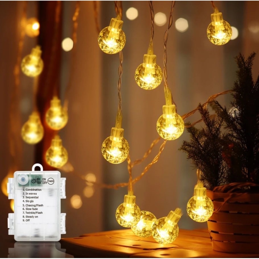 Aigostar - Cadena de luces LED para exterior 100xLED/3xAA/8 funciones 10,3 m IP44 blanco cálido