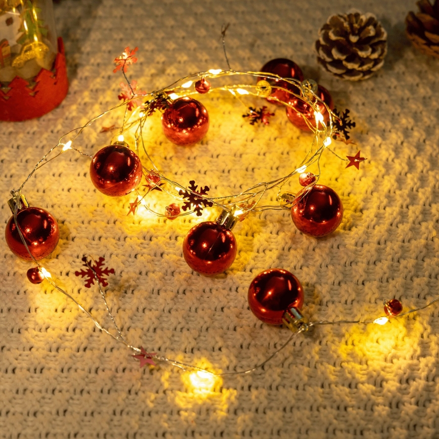 Aigostar - Cadena de luces LED para Navidad 20xLED/3xAA 2 m blanco cálido
