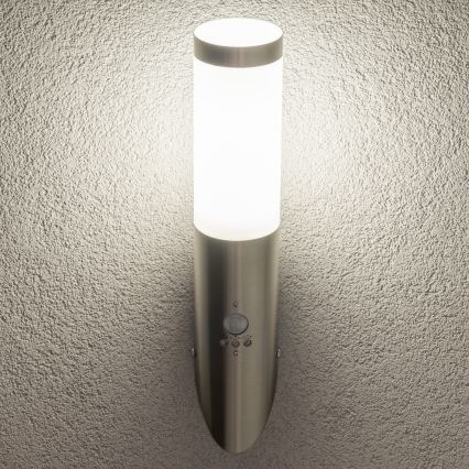BRILAGI - Aplique de pared exterior con sensor ELIA 1xE27/20W/230V IP44 cromo mate