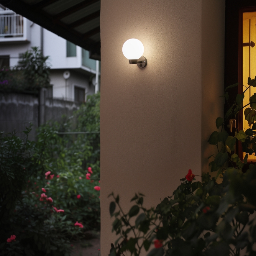 BRILAGI - Aplique de pared exterior con sensor de movimiento HARBOR 1xE27/40W/230V IP33 negro/blanco