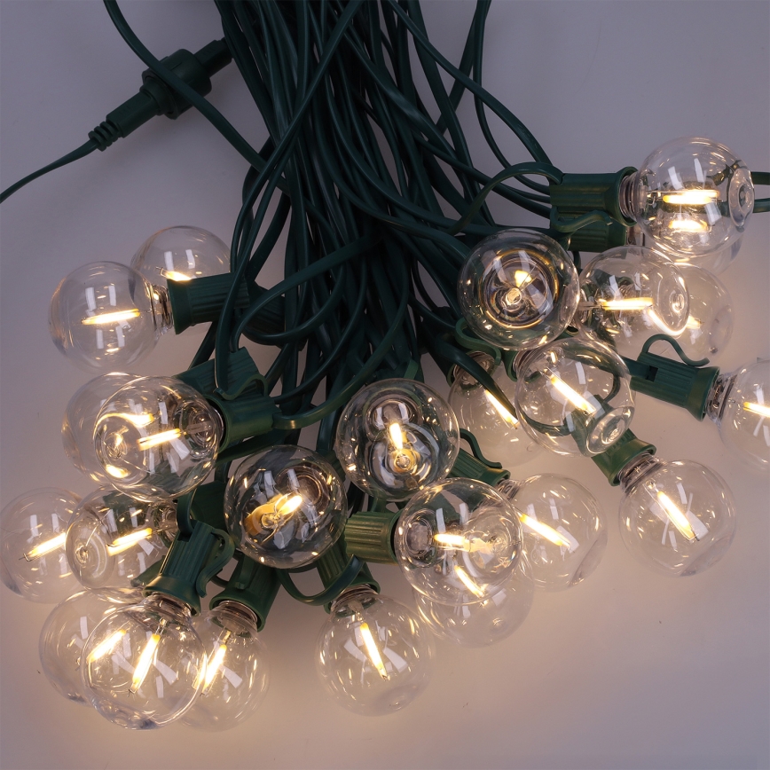 Brilagi - Guirnalda decorativa LED para exterior GIRLANDA 25xE12/0,8W/230V 20m verde IP44 blanco cálido