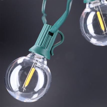 Brilagi - Guirnalda decorativa LED para exterior GIRLANDA 25xE12/0,8W/230V 20m verde IP44 blanco cálido