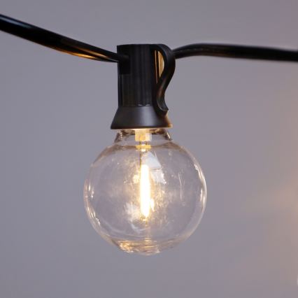 Brilagi - Cadena decorativa LED para exterior GIRLANDA 10xE12/0,6W/230V 8m negra IP44 blanco cálido