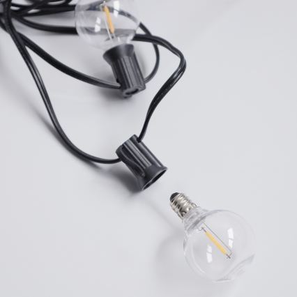 Brilagi - Cadena decorativa LED para exterior GIRLANDA 10xE12/0,6W/230V 8m negra IP44 blanco cálido