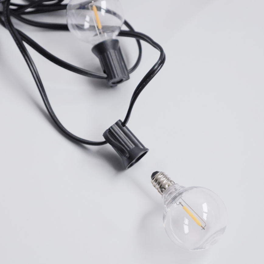 Brilagi - Cadena decorativa LED para exterior GIRLANDA 10xE12/0,6W/230V 8m negra IP44 blanco cálido