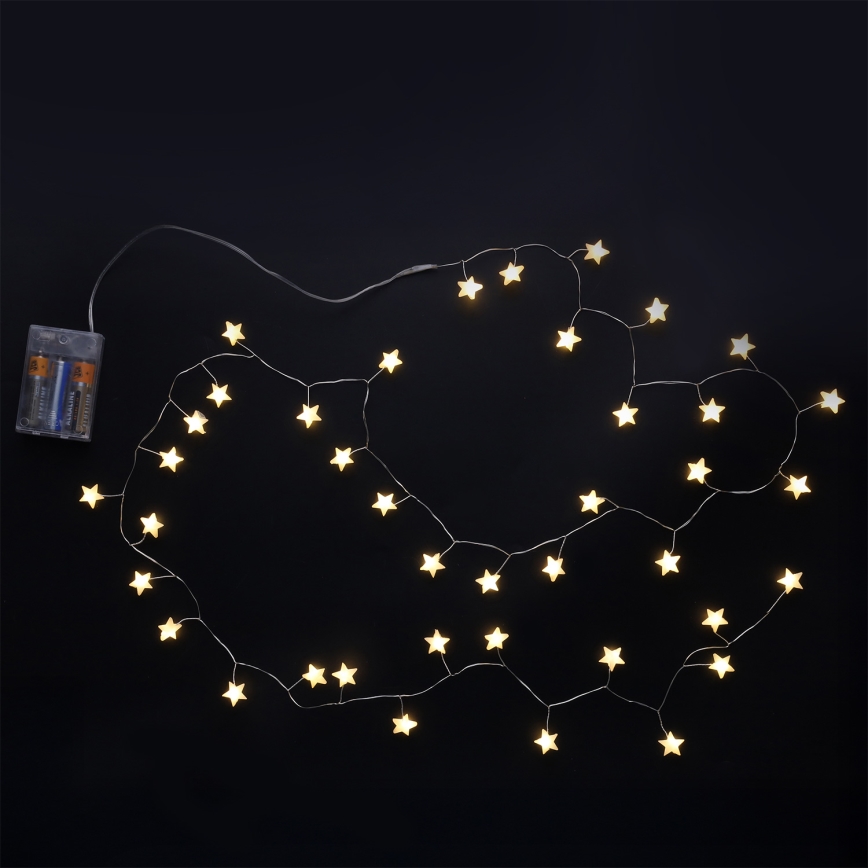 BRILAGI - Guirnalda de Navidad LED 40 LEDs / 3 pilas AA, 1,8 m, blanco cálido, con estrellas