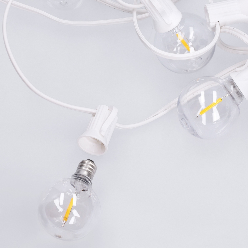 Brilagi - Cadena decorativa LED para exterior GIRLANDA 10xE12/0,6W/230V 8m blanco IP44 blanco cálido
