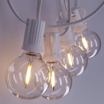 Brilagi - Guirnalda decorativa LED para exterior GIRLANDA 25xE12/0,8W/230V 20m blanca IP44 blanco cálido
