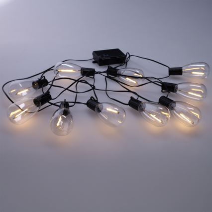 Brilagi - Guirnalda LED para exteriores, 10 LEDs / 3x AA, 3,2 m, IP44, blanco cálido
