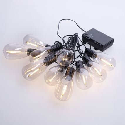 Brilagi - Guirnalda LED para exteriores, 10 LEDs / 3x AA, 3,2 m, IP44, blanco cálido