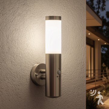 BRILAGI - Lámpara de pared exterior ELIA con sensor 1x E27/20W/230V IP44 cromo mate