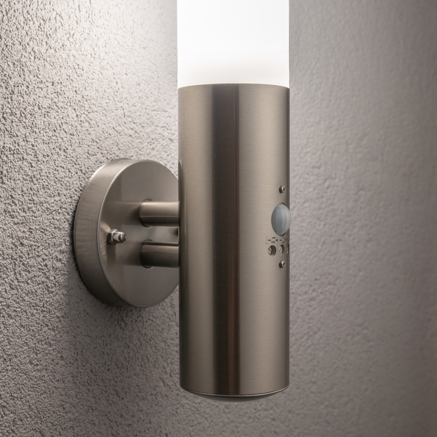 BRILAGI - Lámpara de pared exterior ELIA con sensor 1x E27/20W/230V IP44 cromo mate