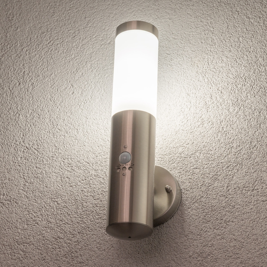 BRILAGI - Lámpara de pared exterior ELIA con sensor 1x E27/20W/230V IP44 cromo mate