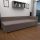 Cama tapizada AMSTERDAM 90x200 cm con cabecero reversible y amplio espacio de almacenamiento, beige