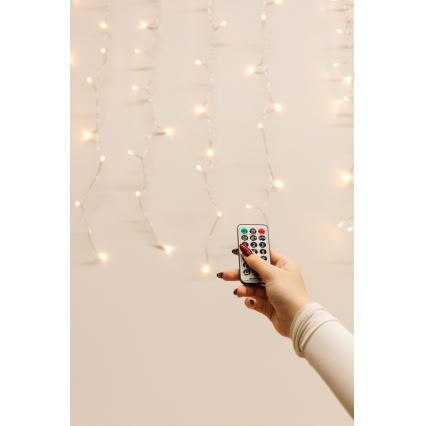 Cortina LED regulable para exteriores CURTAIN 360xLED/8,4W/230V 2x2 m IP44 blanco cálido + control remoto