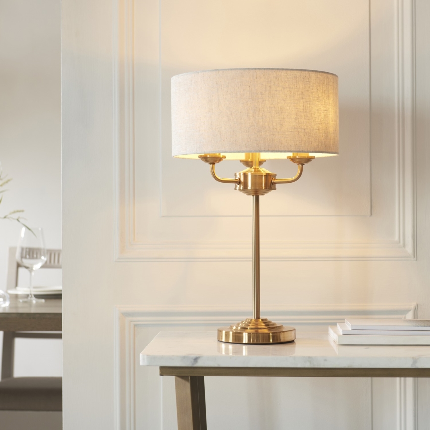 Endon 110721 - Lámpara de mesa HIGHCLERE 3xE14/18W/230V beige/latón diá. 32 cm