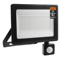 Foco LED exterior con sensor de movimiento y sensor crepuscular LED/100W/230V 4500K IP65 negro