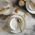 Juego de vajilla de 16 piezas, porcelana blanca con detalles dorados