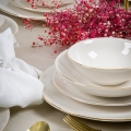 Juego de vajilla de 24 piezas de porcelana blanca con detalles dorados