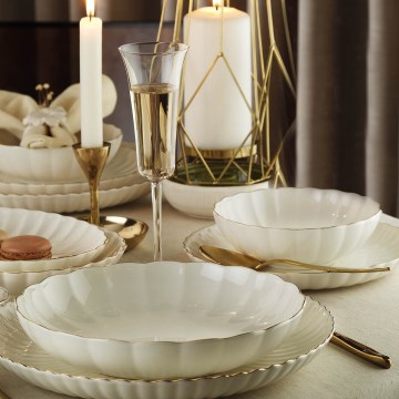 Juego de vajilla de 24 piezas en porcelana blanca con detalles dorados