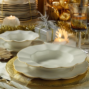 Juego de vajilla de 24 piezas en porcelana blanca con detalles dorados