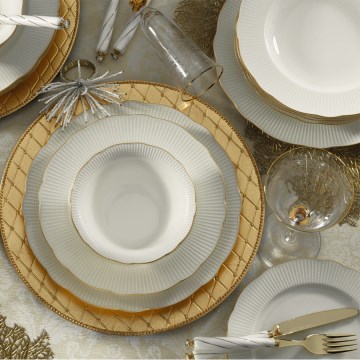 Juego de vajilla de 24 piezas en porcelana blanca con detalles dorados