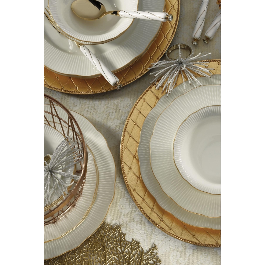 Juego de vajilla de 26 piezas en porcelana blanca con detalles dorados