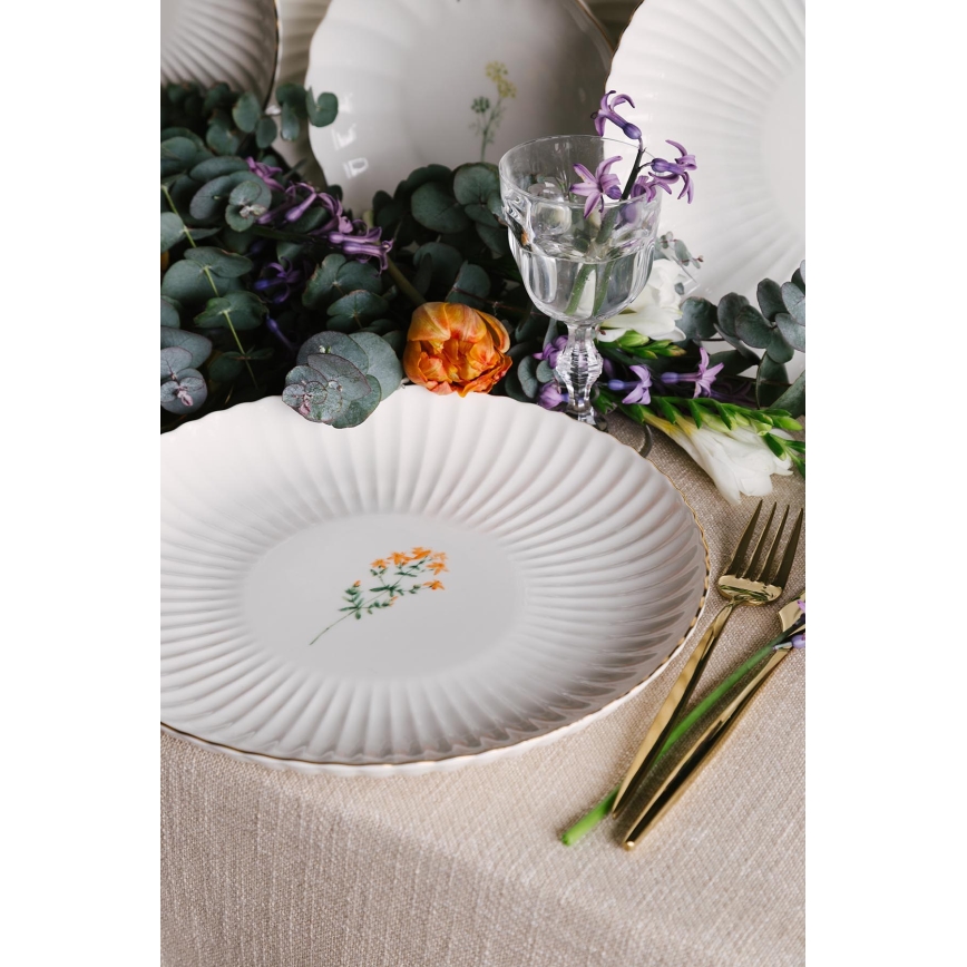 Juego de vajilla de 27 piezas en porcelana blanca con detalles dorados