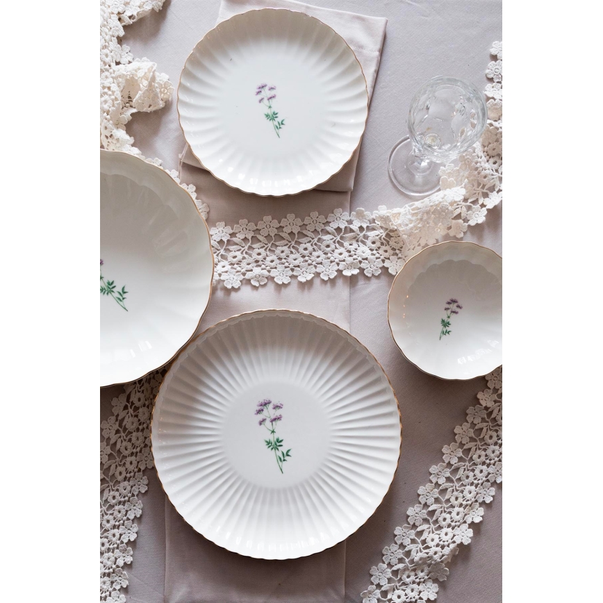 Juego de vajilla de 27 piezas en porcelana blanca con detalles dorados