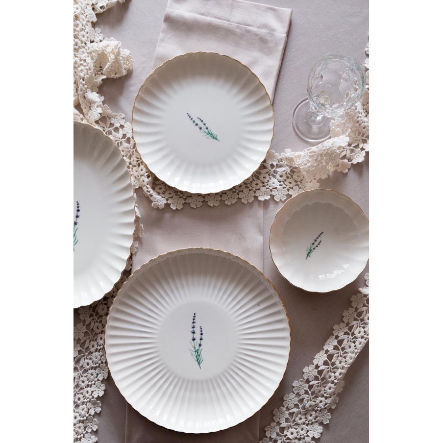 Juego de vajilla de 27 piezas en porcelana blanca con detalles dorados