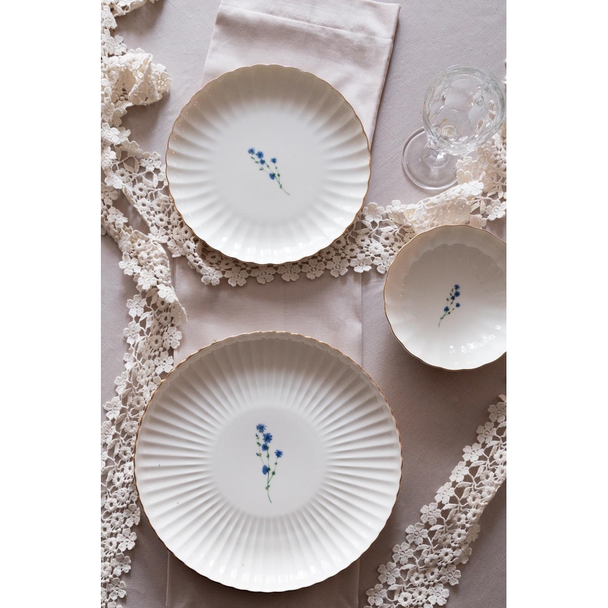 Juego de vajilla de 27 piezas en porcelana blanca con detalles dorados