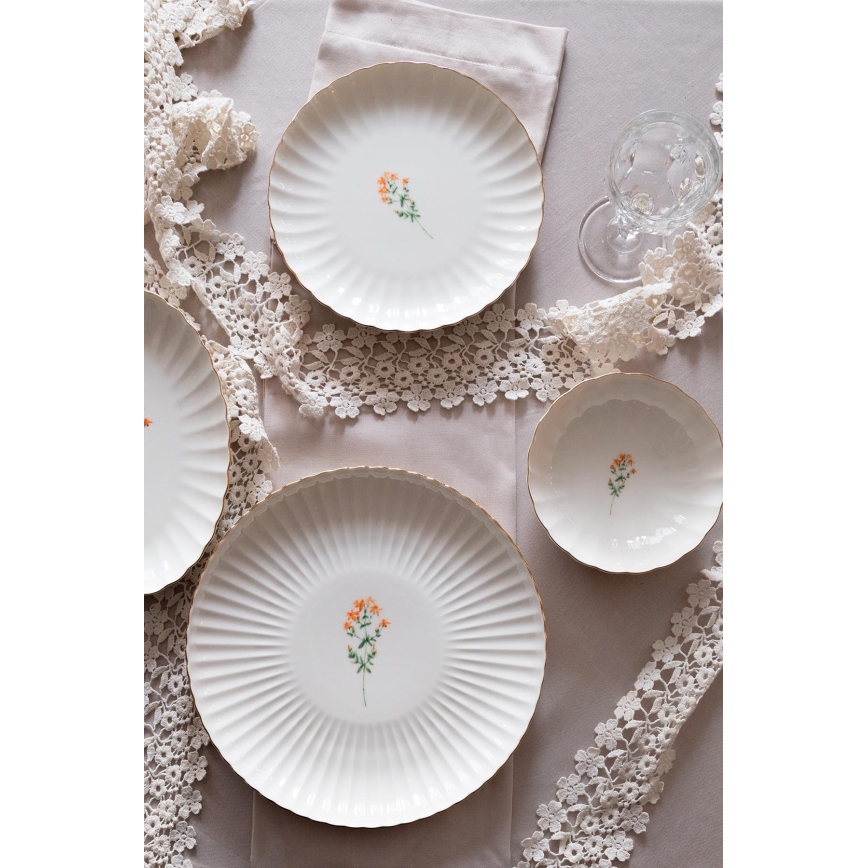 Juego de vajilla de 27 piezas en porcelana blanca con detalles dorados