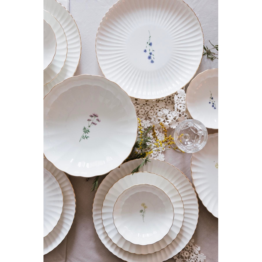 Juego de vajilla de 27 piezas en porcelana blanca con detalles dorados