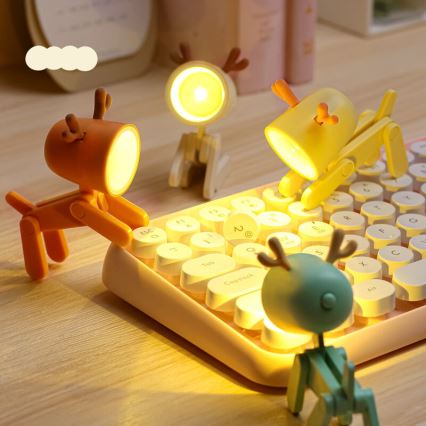 Lámpara de mesa LED LED/0,06W/3xLR41 con forma de reno, color naranja