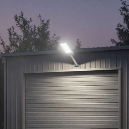 Lámpara solar de calle LED regulable con sensor VENICE LED/100W/3,2V 6000 mAh IP65 negra + mando a distancia