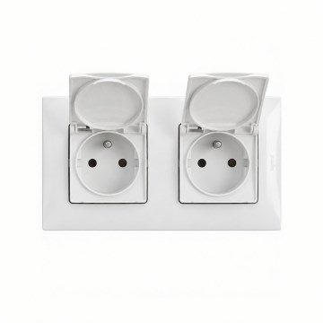 Legrand - Toma de corriente doble para exterior de uso doméstico con marco NILOE 250V IP44 blanca