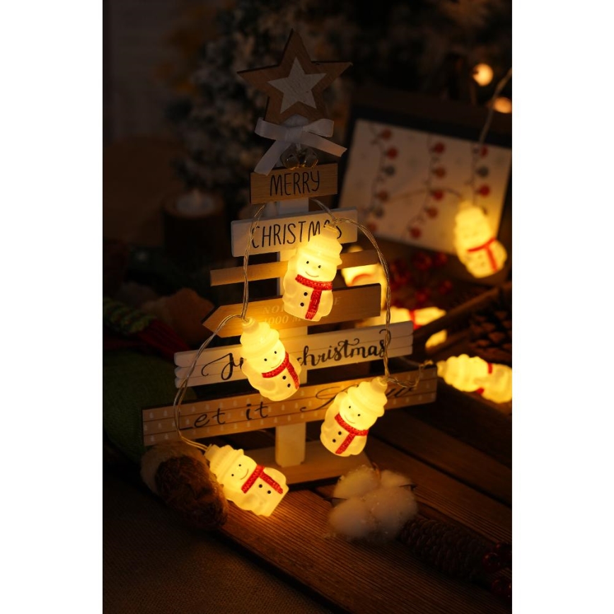 Cadena de luces LED de Navidad 20xLED/3xAA/blanco cálido 3,3m muñecos de nieve