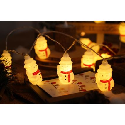 Cadena de luces LED de Navidad 20xLED/3xAA/blanco cálido 3,3m muñecos de nieve