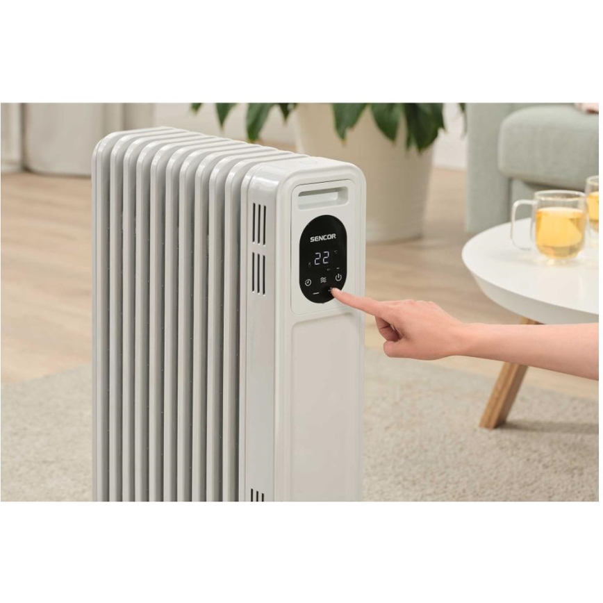 Sencor - Radiador de aceite de 11 secciones 1000/2300 W/230 V blanco + mando a distancia