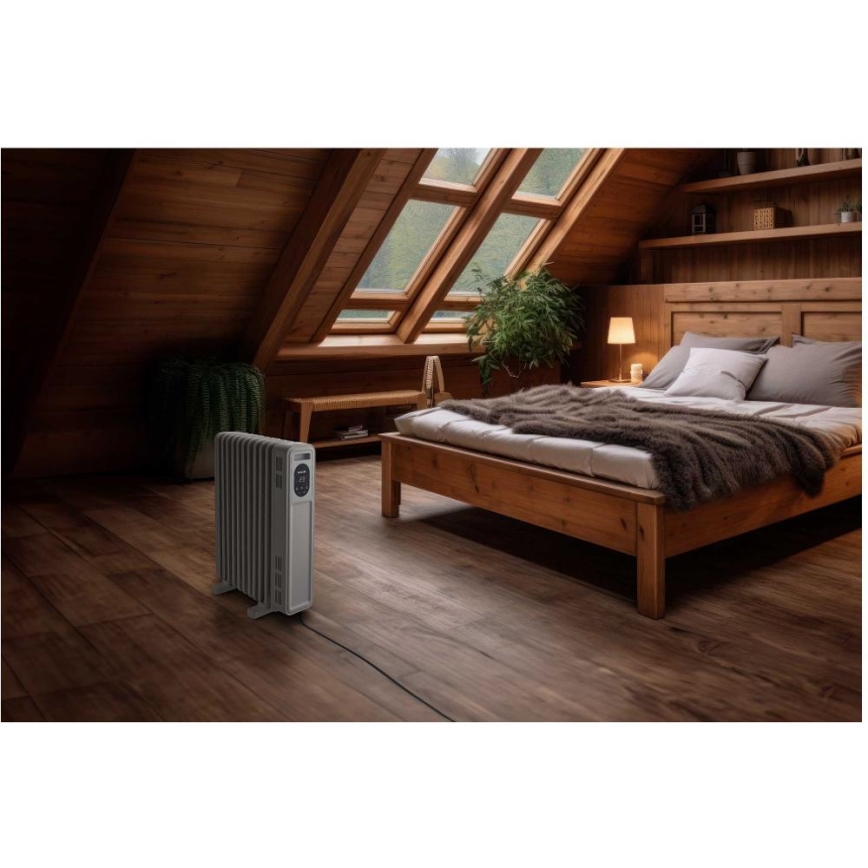 Sencor - Radiador de aceite de 11 secciones 1000/2300 W/230 V blanco + mando a distancia