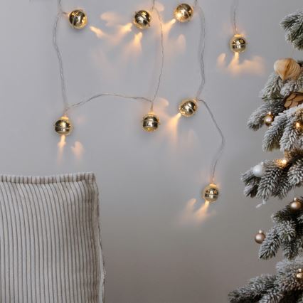 Guirnalda LED 10xLED/2xAA/blanco cálido 1,8 m con cascabeles